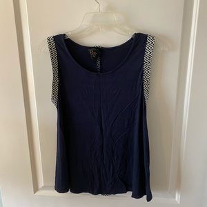 Navy tank top with geometric border and backing